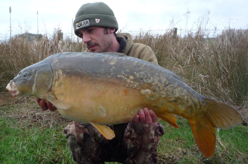 James with a mirror carp